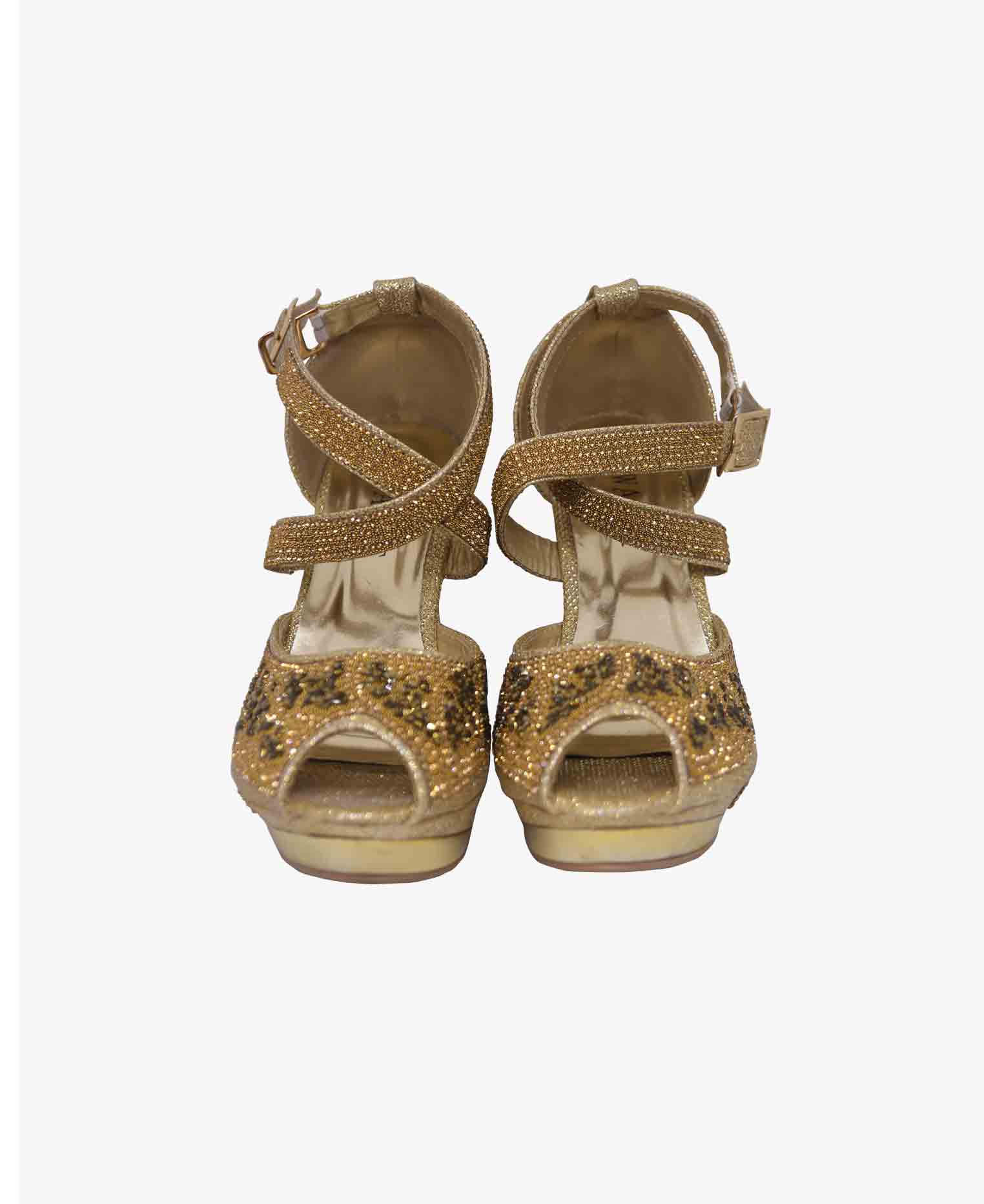 Golden colored Boston heel 